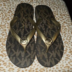 Michael Kors Black and Gold Flip Flops